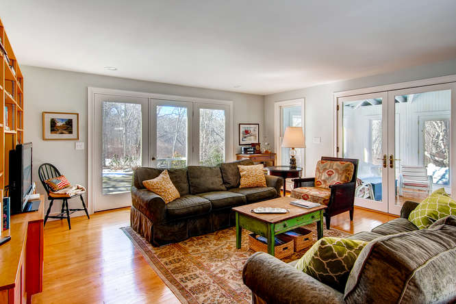 19 North Tabor Farm Road Chilmark, MA 02535 - Photo 9 of 24 Living Room opens to stone terrace and also to Sunroom/Screened porch.