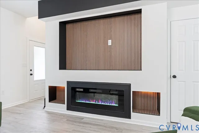 a living room with a fireplace