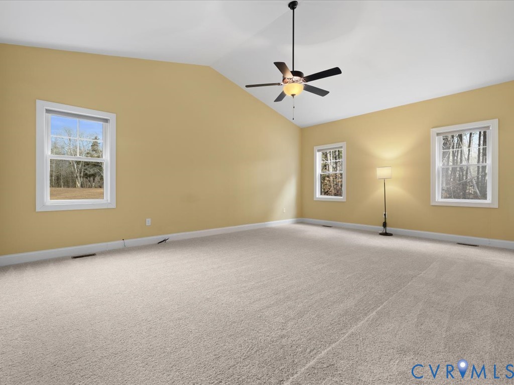 2806 Perkinsville Road Maidens, VA 23102 - Photo 18 of 38 a view of a livingroom with a ceiling fan and window