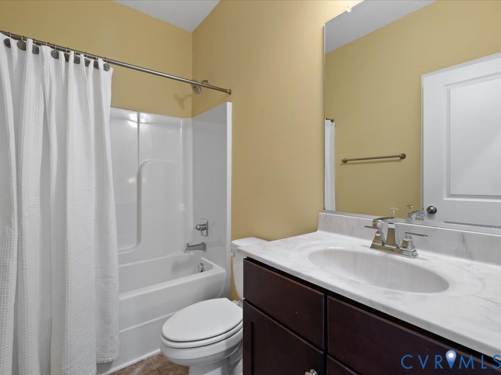 2806 Perkinsville Road Maidens, VA 23102 - Photo 24 of 38 a bathroom with a sink toilet and shower