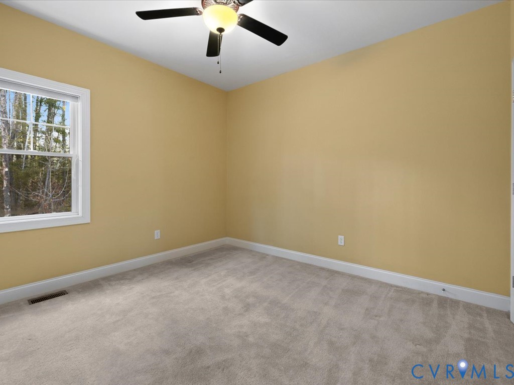 2806 Perkinsville Road Maidens, VA 23102 - Photo 25 of 38 an empty room with a window