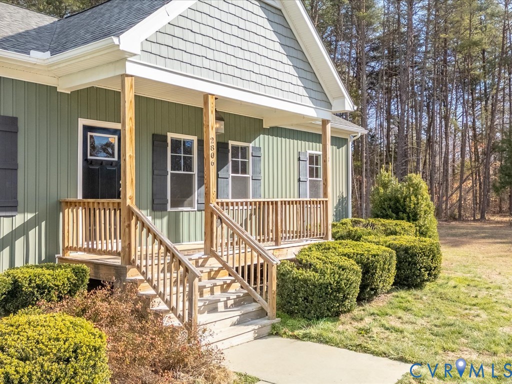 2806 Perkinsville Road Maidens, VA 23102 - Photo 3 of 38 a view of a house with a small yard and wooden floor and fence