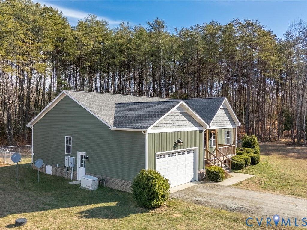 2806 Perkinsville Road Maidens, VA 23102 - Photo 32 of 38 a view of a house with a yard