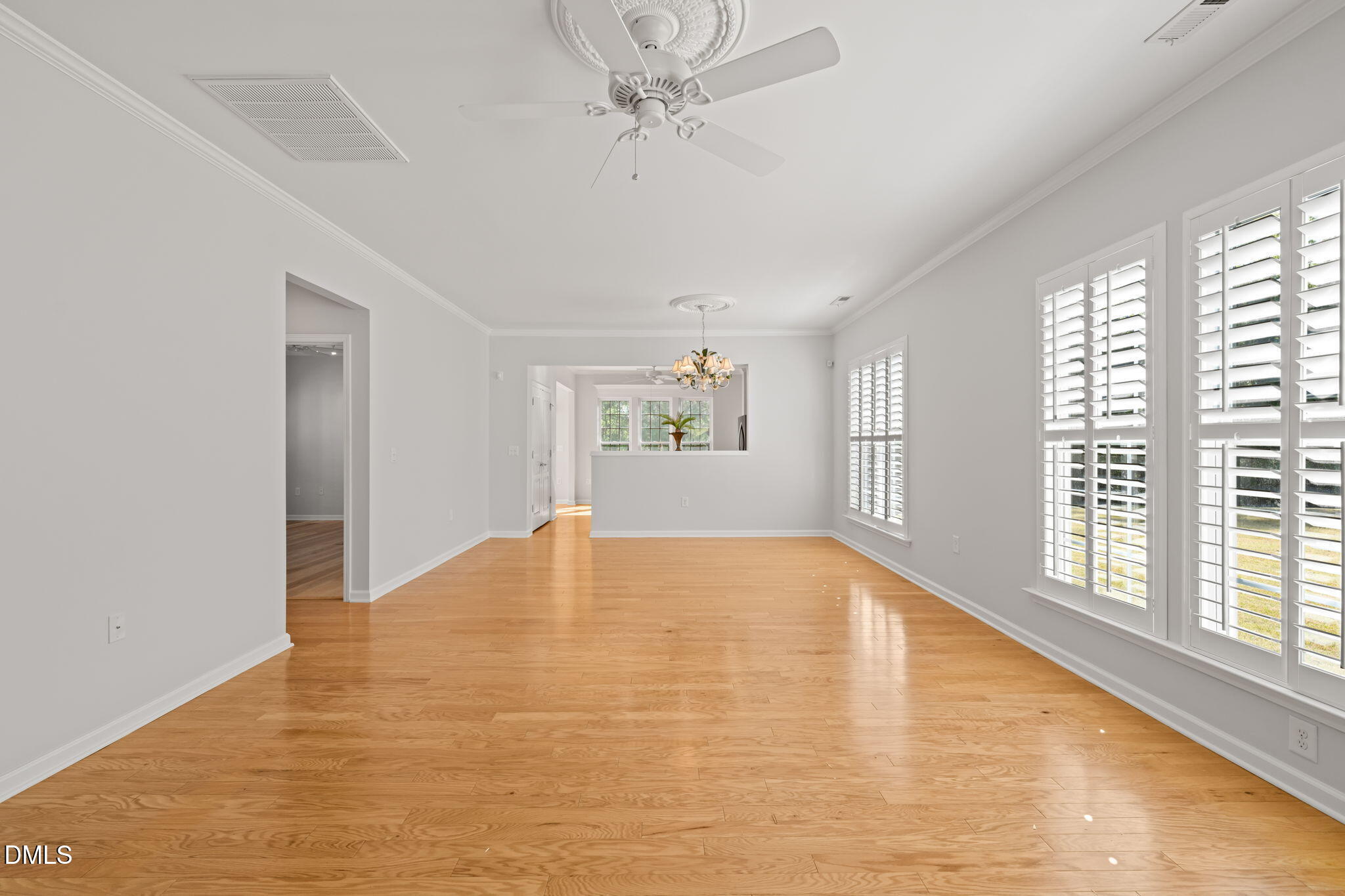 555 Tomkins Loop Cary, NC 27519 - Photo 11 of 50 a view of an empty room with a window