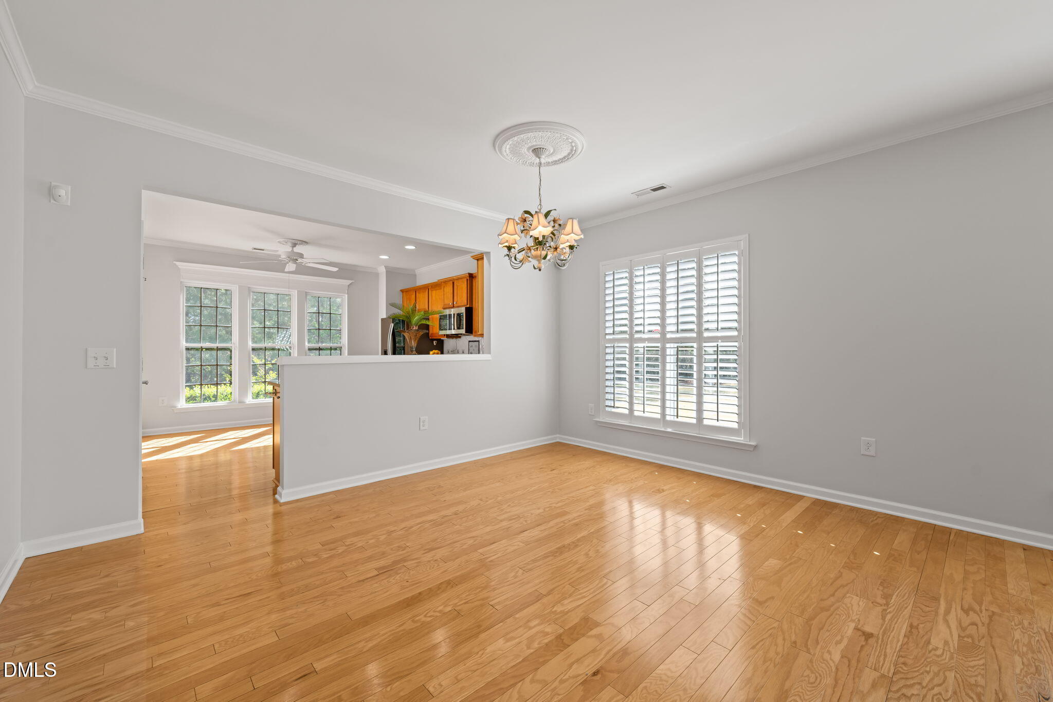 555 Tomkins Loop Cary, NC 27519 - Photo 12 of 50 a view of an empty room with a window