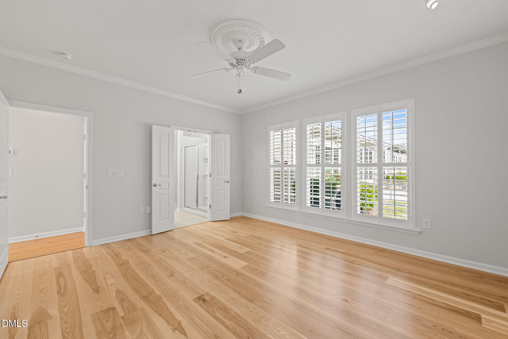 555 Tomkins Loop Cary, NC 27519 - Photo 21 of 50 a view of an empty room with a window
