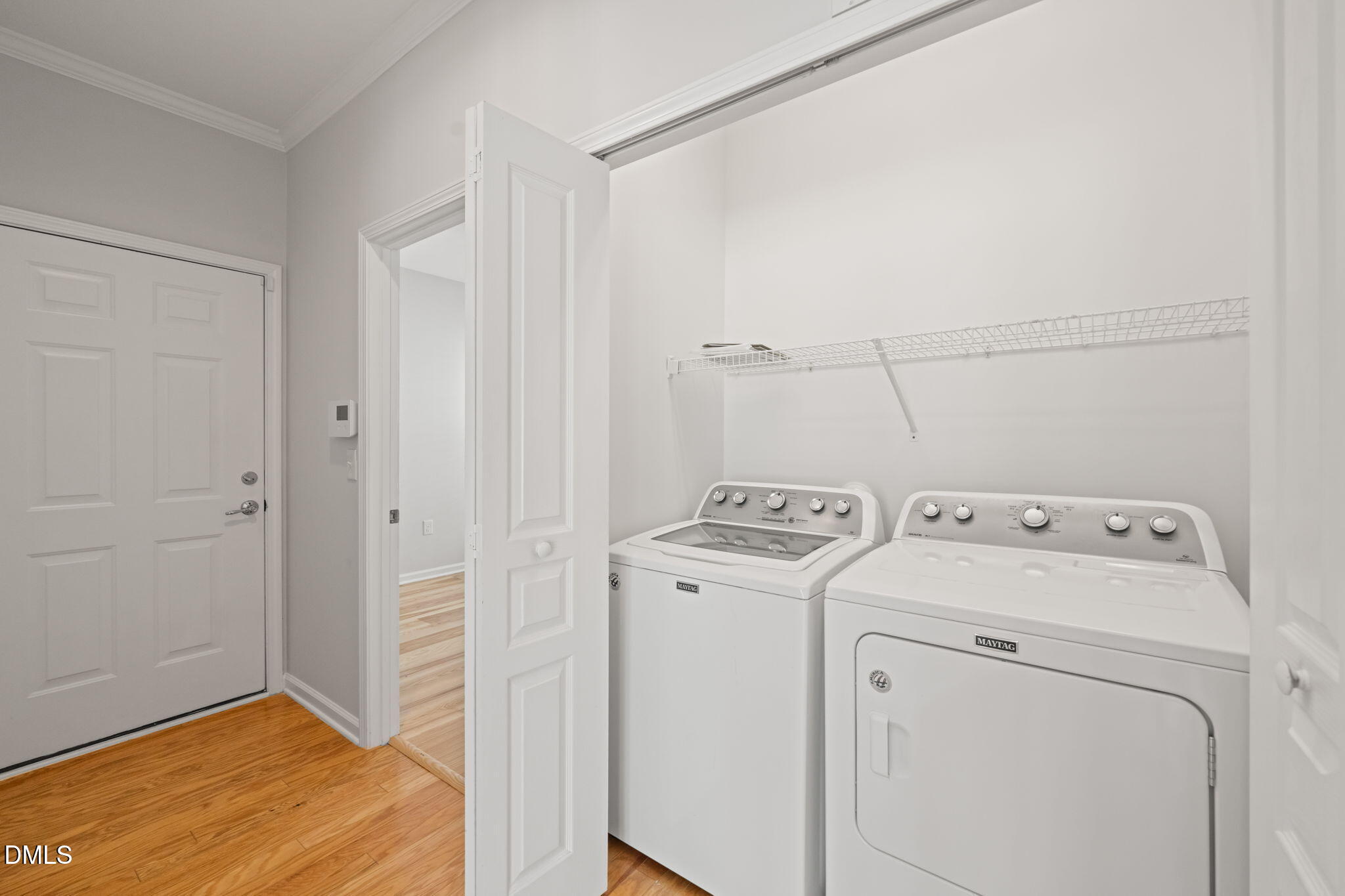 555 Tomkins Loop Cary, NC 27519 - Photo 32 of 50 a view of storage and utility room with washer and dryer