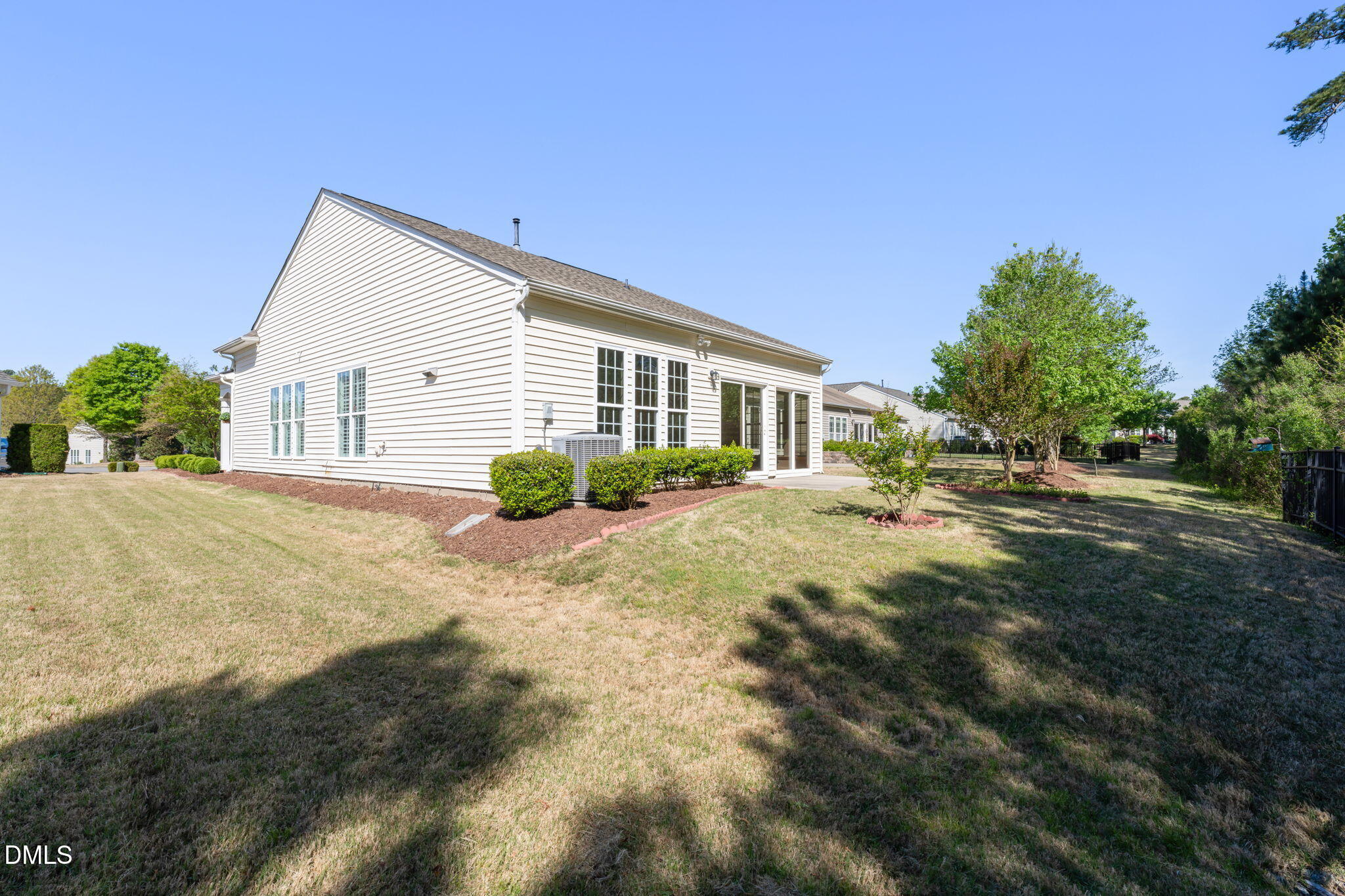 555 Tomkins Loop Cary, NC 27519 - Photo 36 of 50 a view of a house with a yard