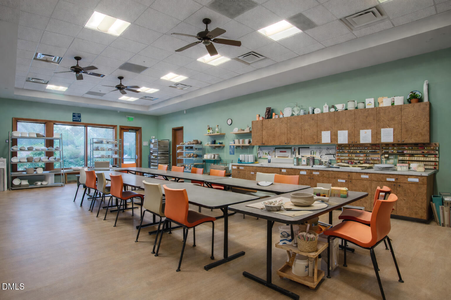 555 Tomkins Loop Cary, NC 27519 - Photo 38 of 50 a view of a dining room with furniture and chandelier