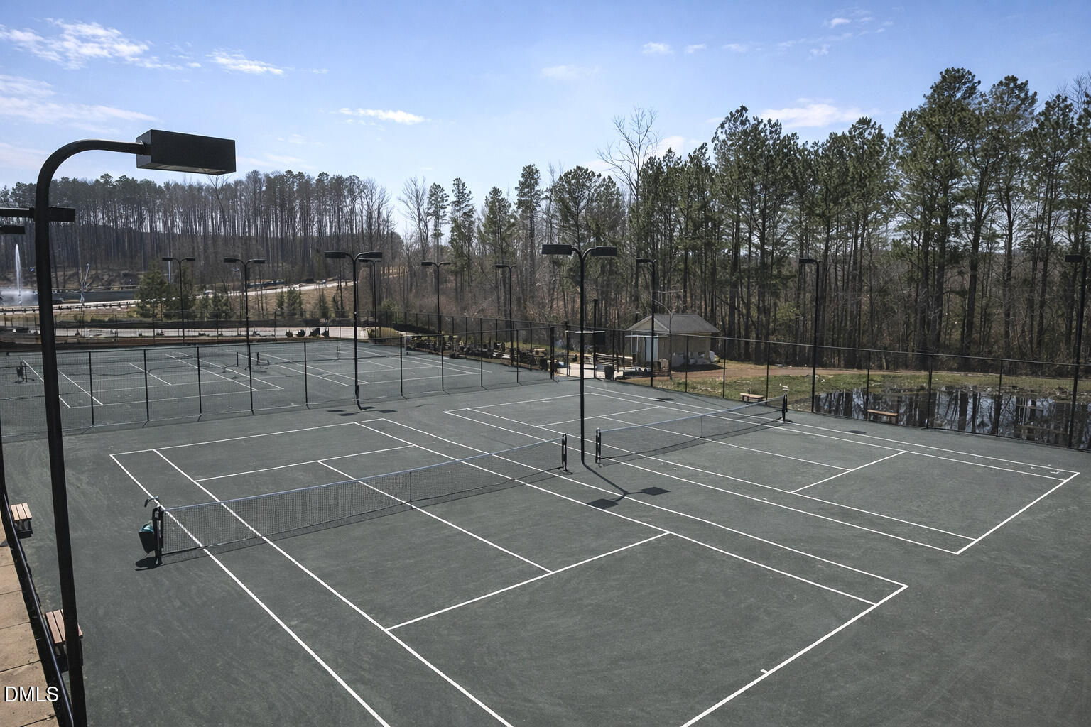 555 Tomkins Loop Cary, NC 27519 - Photo 44 of 50 a view of a tennis court