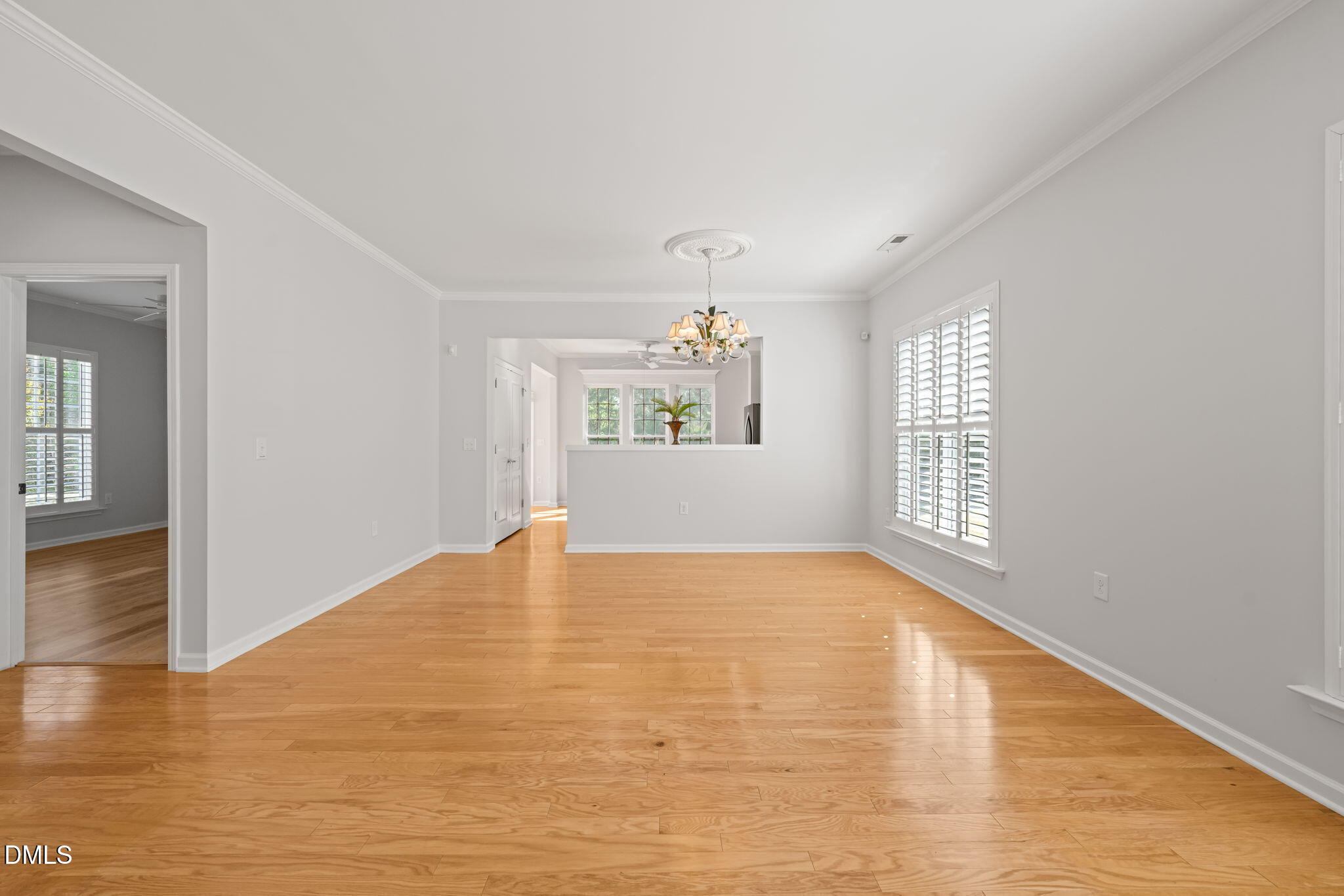 555 Tomkins Loop Cary, NC 27519 - Photo 6 of 50 a view of an empty room with window