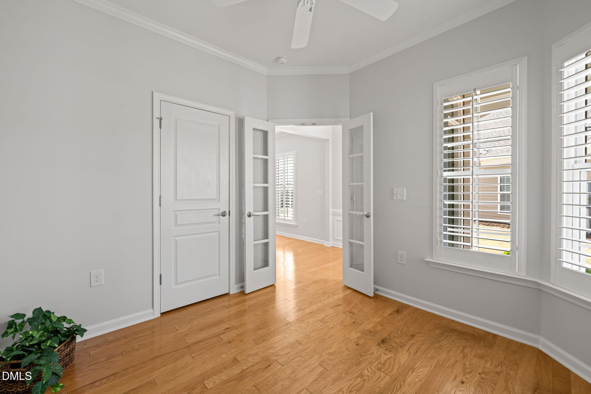 555 Tomkins Loop Cary, NC 27519 - Photo 7 of 50 a view of an empty room with a window