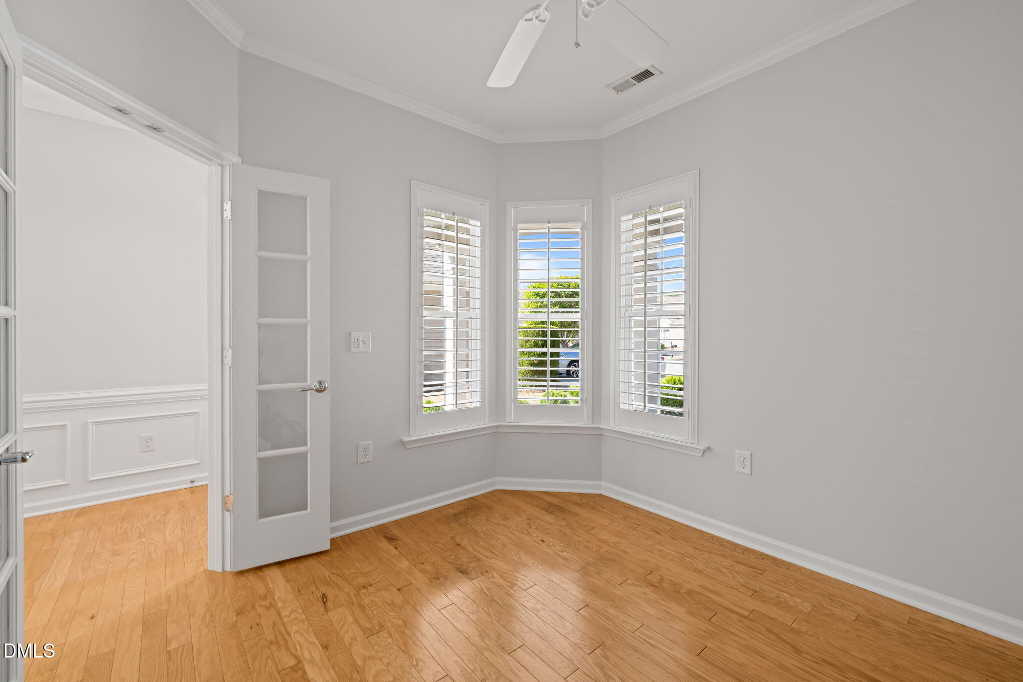 555 Tomkins Loop Cary, NC 27519 - Photo 8 of 50 an empty room with a natural light
