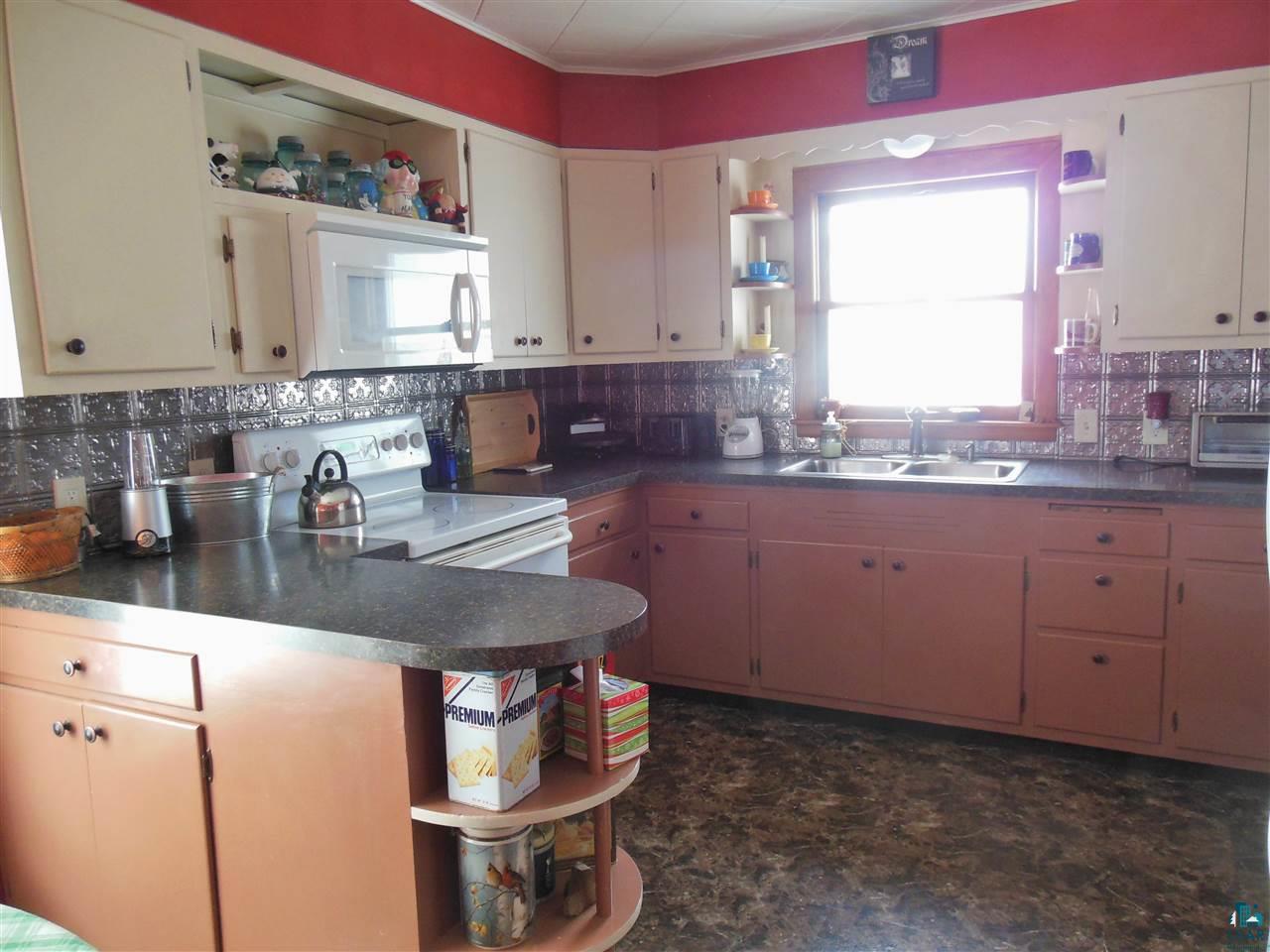 585 Center Road Wright, MN 55798 - Photo 3 of 24 Bright and sunny with lots of counter space