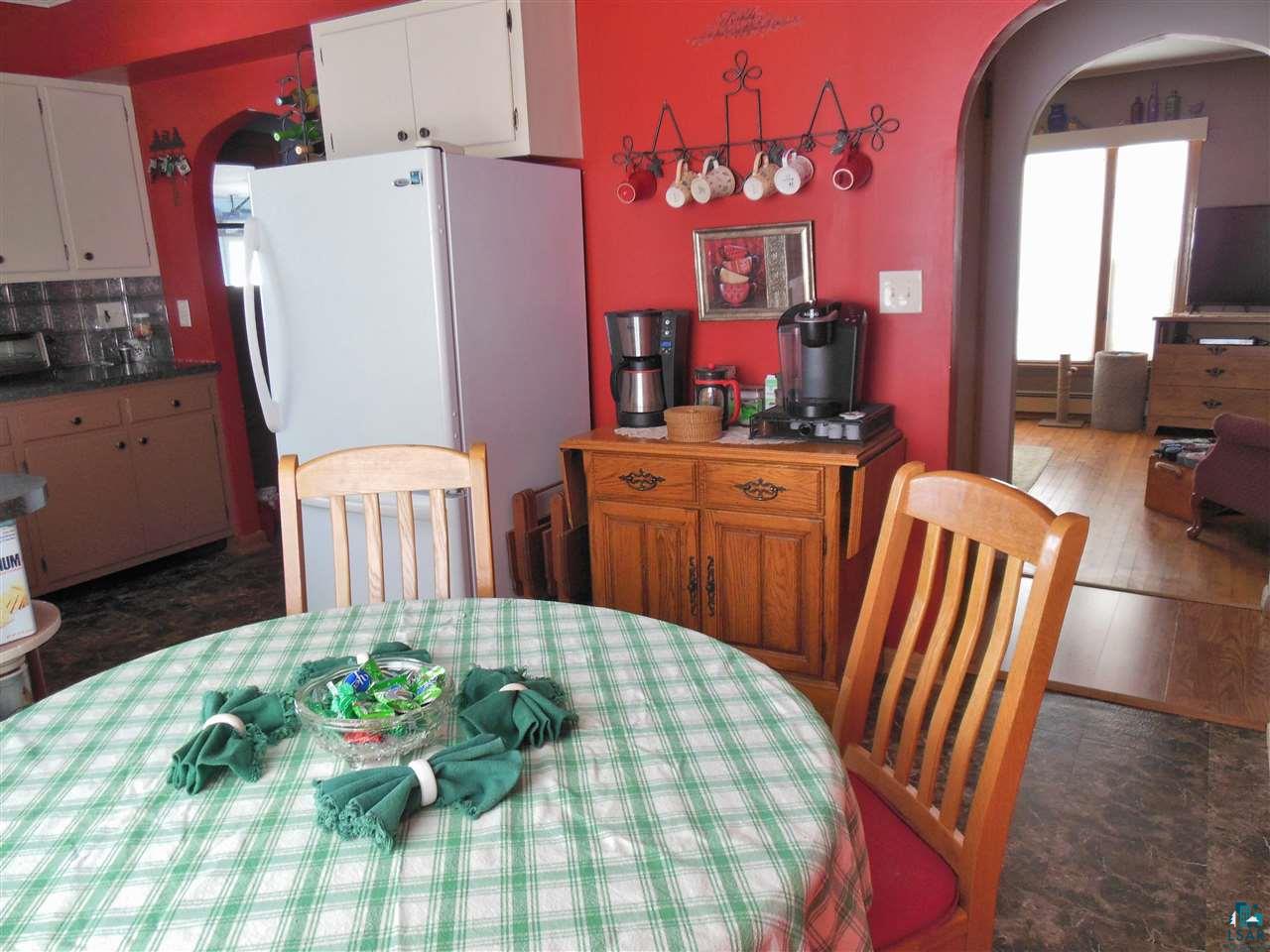 585 Center Road Wright, MN 55798 - Photo 6 of 24 This dining room is open to the kitchen with beautiful views out the living room space