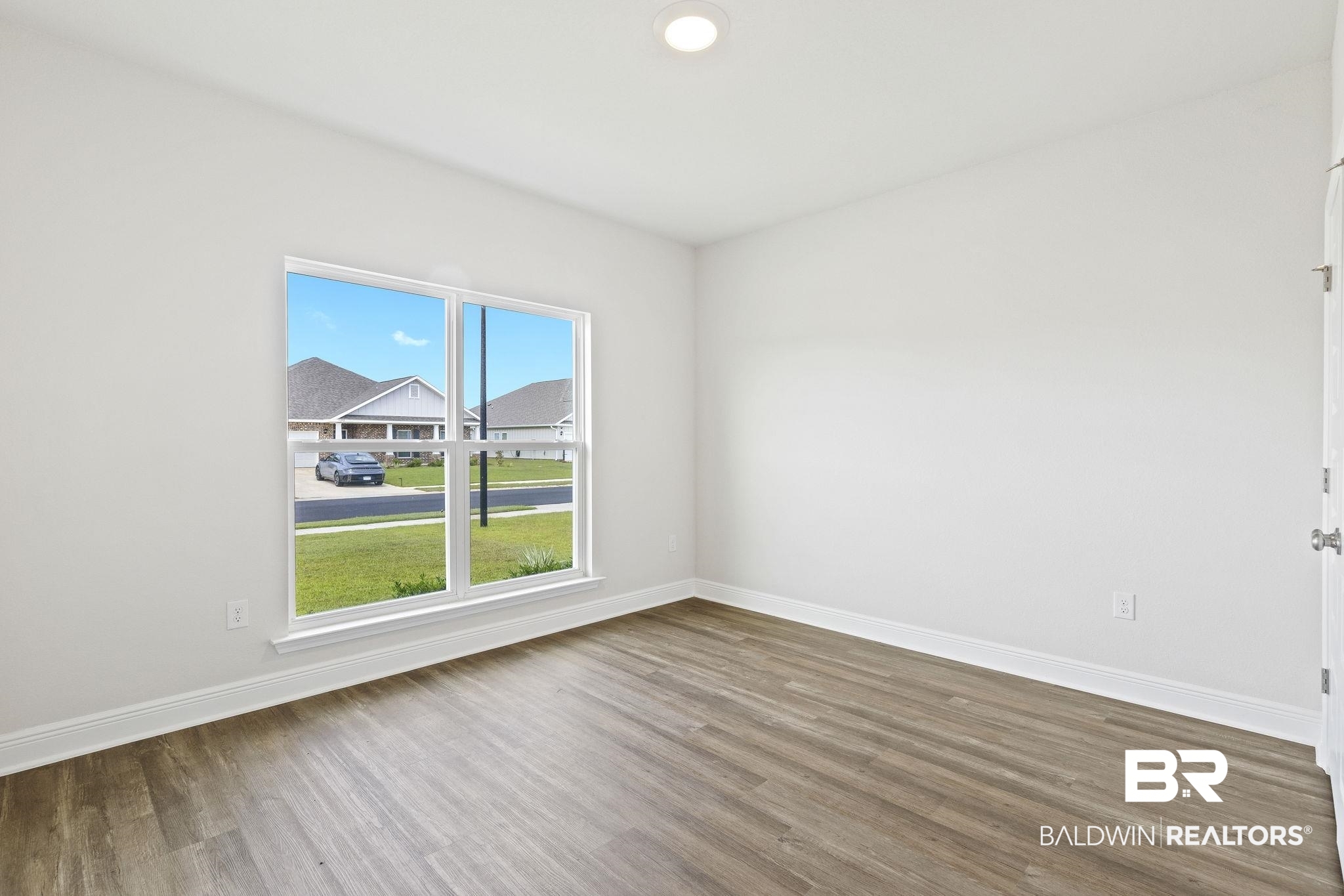 11303 Genuine Risk Circle Daphne, AL 36526 - Photo 58 of 100 Front Bedroom facing the road