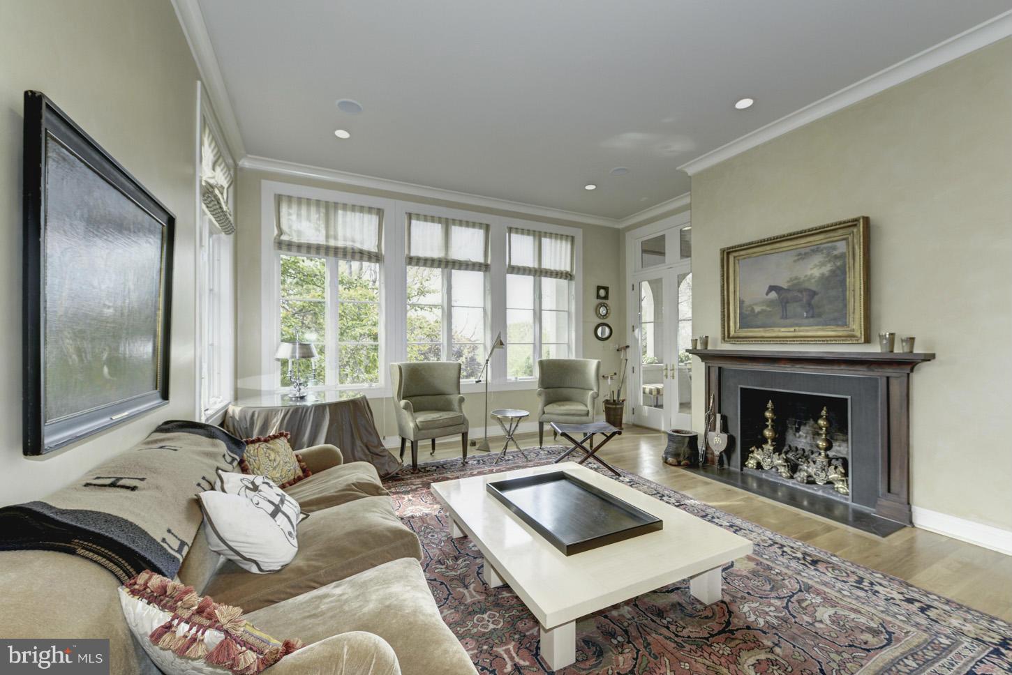 2962 Chain Bridge Road Northwest Washington, DC 20016 - Photo 6 of 14 HAS WALL OF BUILTINS, FIREPLACE AND DOOR TO LOGGIA