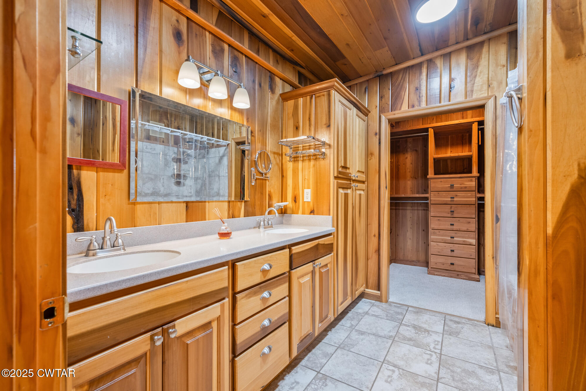 973 Old Lavinia Road Cedar Grove, TN 38321 - Photo 45 of 52 a bathroom with a granite countertop sink and a mirror