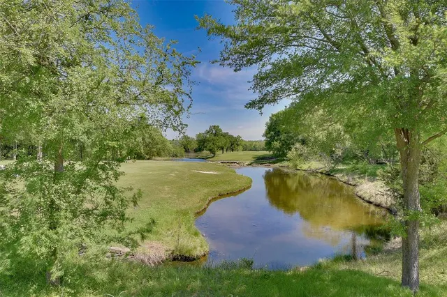 a view of a lake with outdoor space