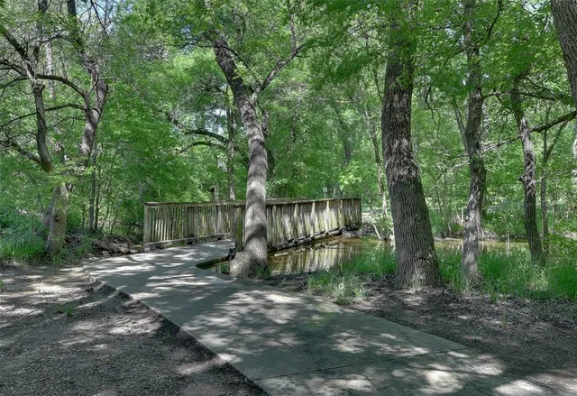 a garden view with a seating space