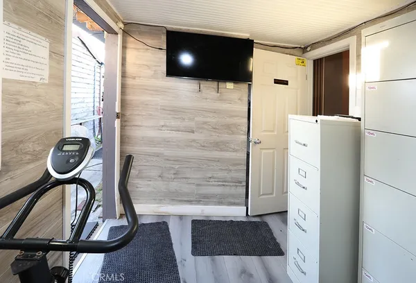 a bathroom with a shower and a mirror