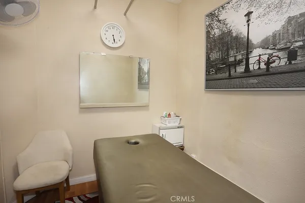 a bathroom with a toilet and a sink