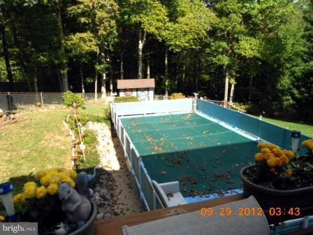 4777 Kelly Road Woodbridge, VA 22193 - Photo 1 of 23 Pool view from top level deck