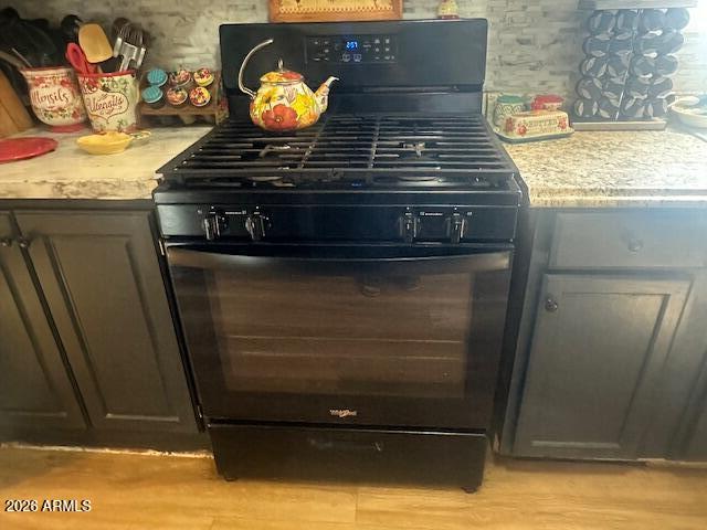 7258 South Lariat Road Hereford, AZ 85615 - Photo 10 of 37 a stove top oven sitting inside of a kitchen