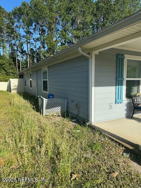 96738 Commodore Point Drive Yulee, FL 32097 - Photo 31 of 40 Left side