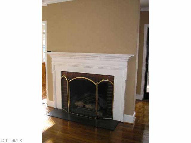 700 Sunset Drive High Point, NC 27262 - Photo 4 of 9 Other. Living room features newly refinished hardwoods, large windows, and fireplace.