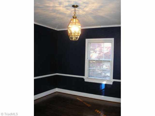 700 Sunset Drive High Point, NC 27262 - Photo 5 of 9 Other. Dining room features newly refinished hardwoods, crown molding and new paint,