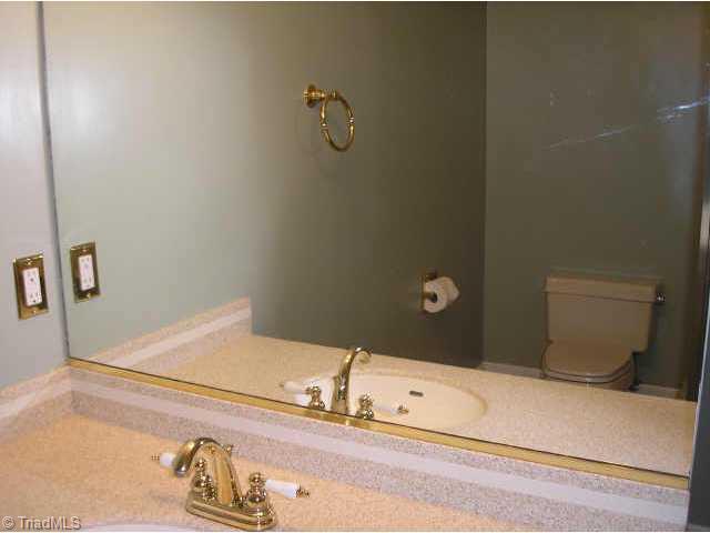 700 Sunset Drive High Point, NC 27262 - Photo 8 of 9 Other. Master bath features, large shower, solid surpface counters, ceramic tile and dressing area.