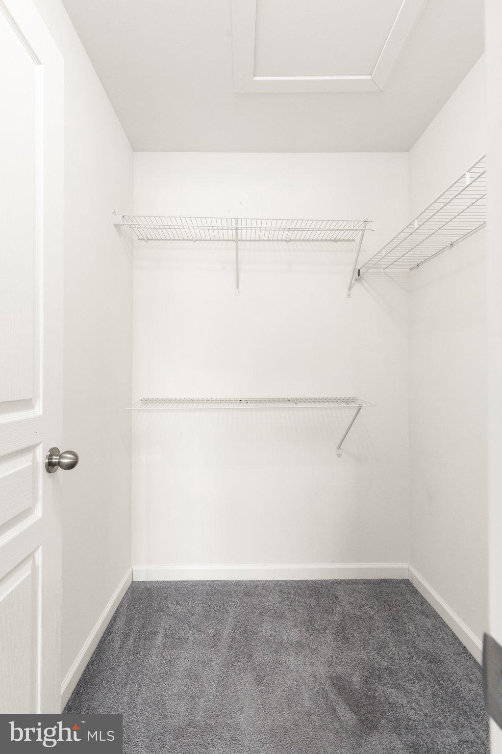 9943 Ravenhurst Road Middle River, MD 21220 - Photo 13 of 23 a view of small space with racks on the wall