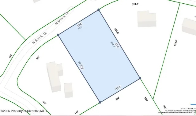 a view of a hallway with staircase