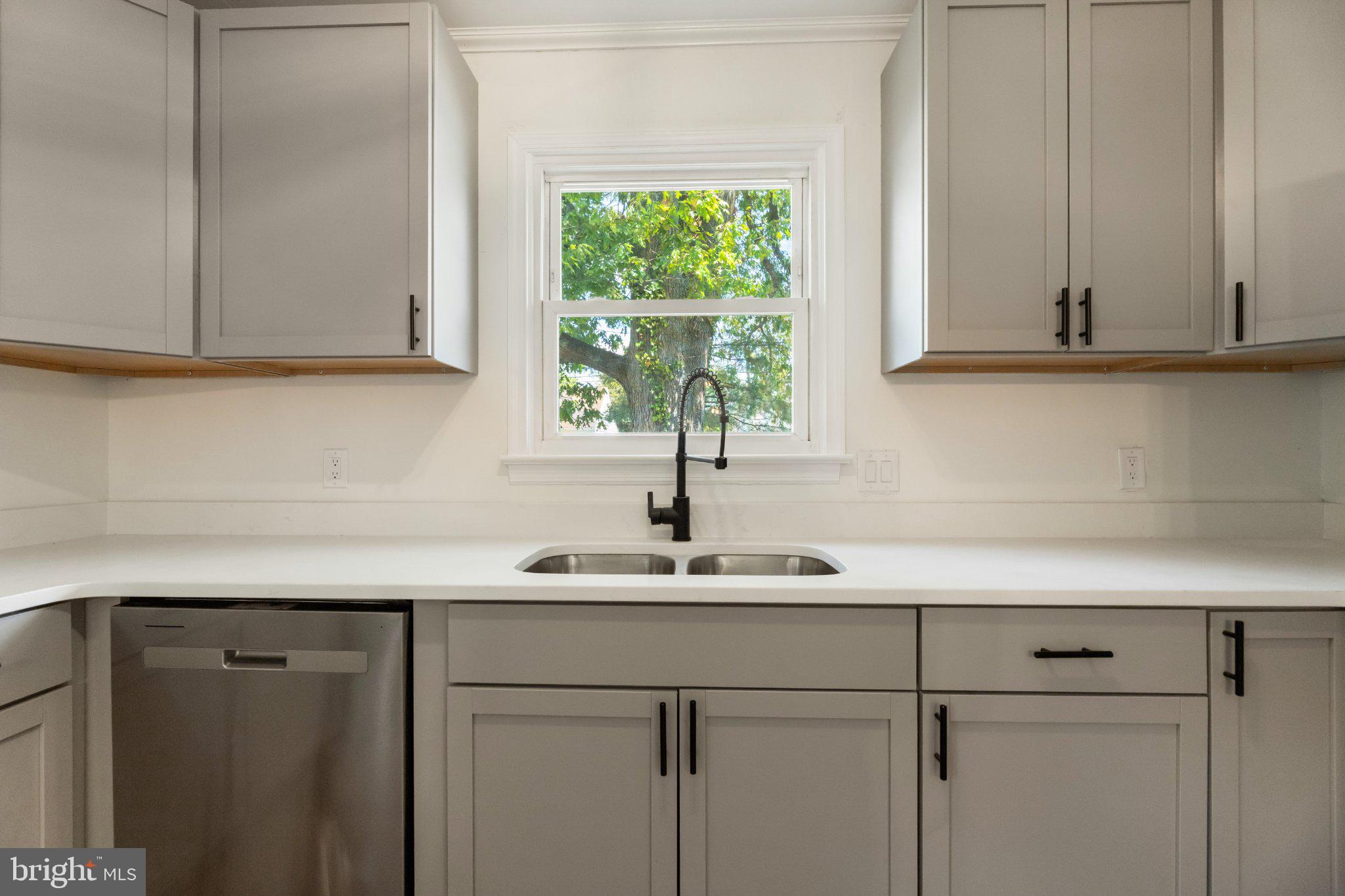 12 Oak Street Cambridge, MD 21613 - Photo 8 of 30 Bright kitchen with modern finishes.