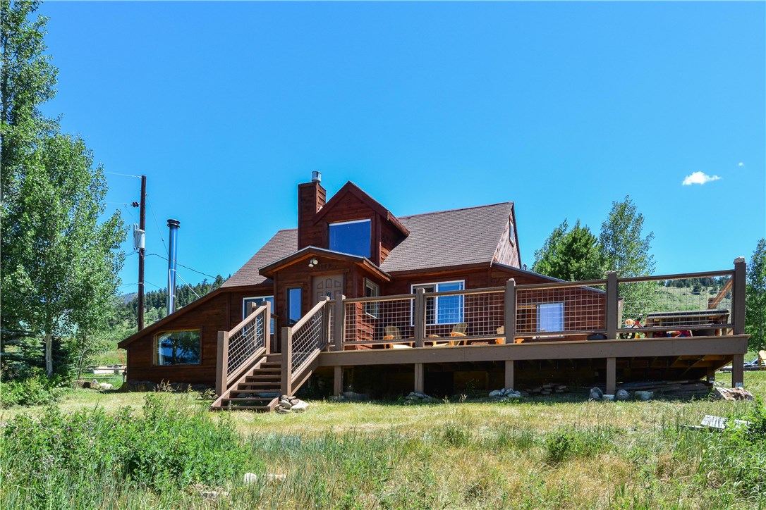 89 V Road Silverthorne, CO 80498 - Photo 1 of 25 Nice rustic cabin in Ptarmigan on over an acre of land.