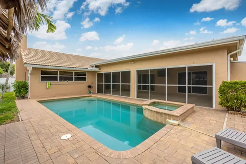 $735,000 | 9208 Sun Pointe Drive, Boynton Beach, FL 33437