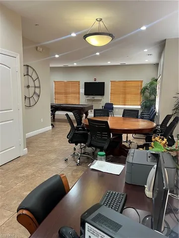 a view of a living room and dining room