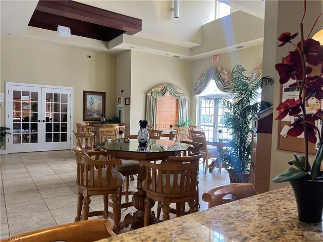 a view of a lake with houses in the background
