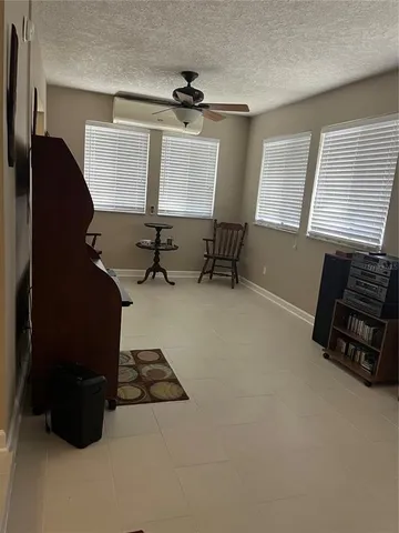 a room with furniture and a window