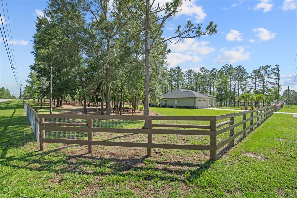 12929 Southwest 89th Street Dunnellon, FL 34432 - Photo 63 of 76 a view of a park that has a bench and a bench