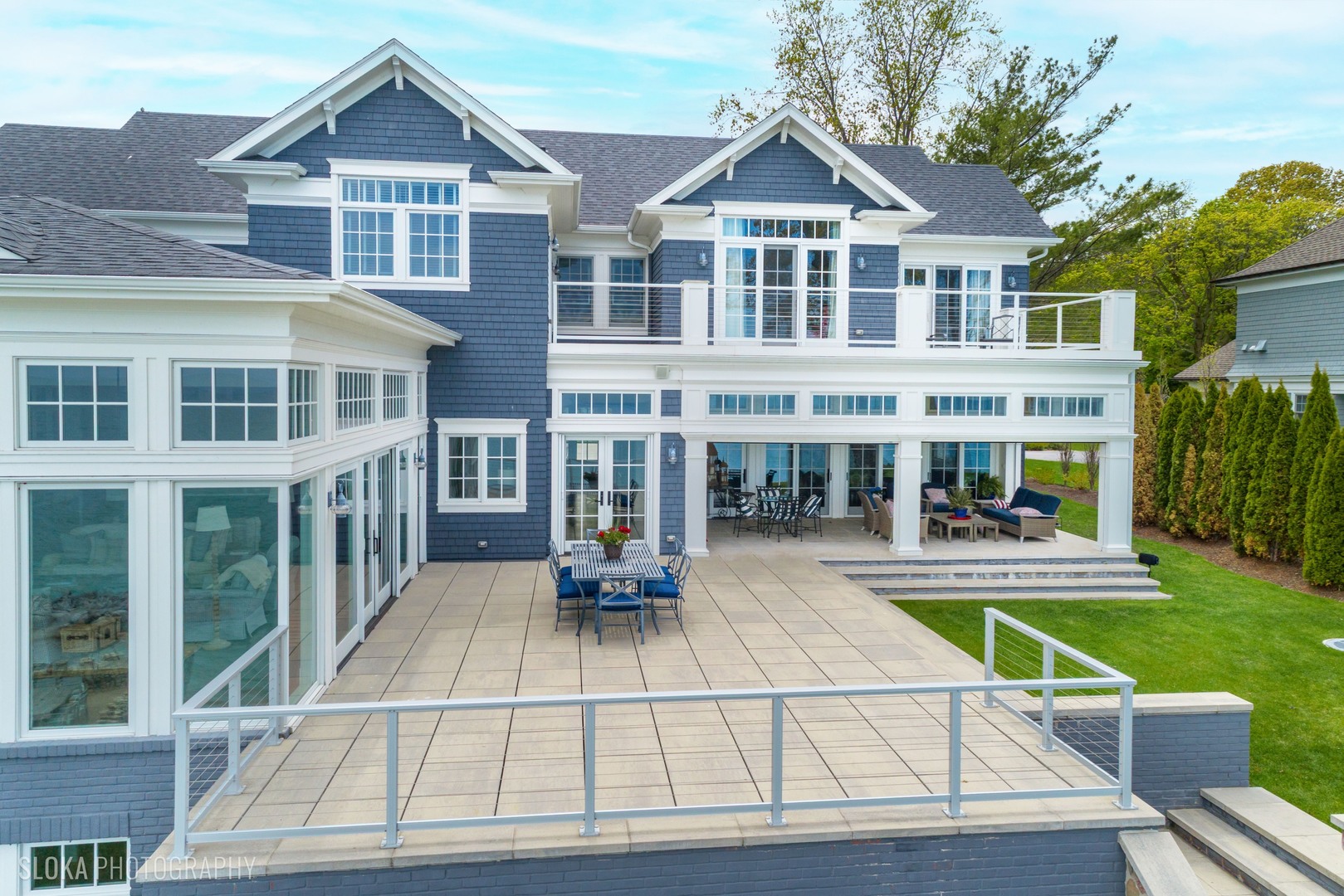 139 Sheridan Road Winnetka, IL 60093 - Photo 19 of 51 a view of a house with a swimming pool