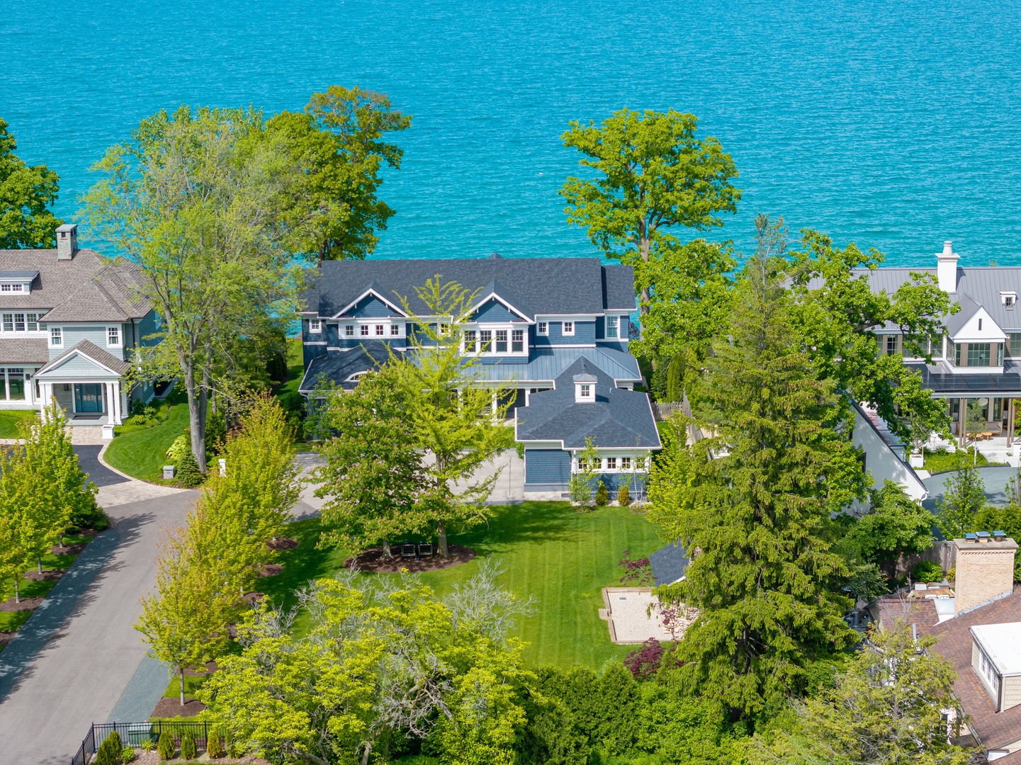 139 Sheridan Road Winnetka, IL 60093 - Photo 50 of 51 a aerial view of a house with a yard potted plants and large tree