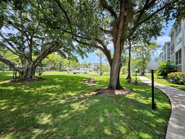 a view of a backyard with a garden