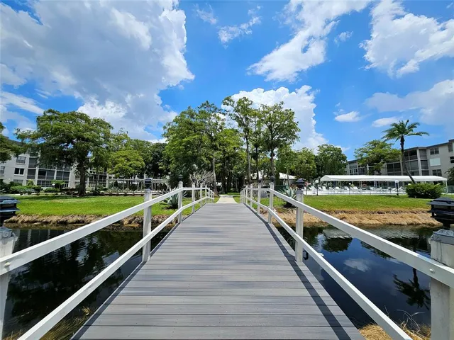 a view of swimming pool with a patio