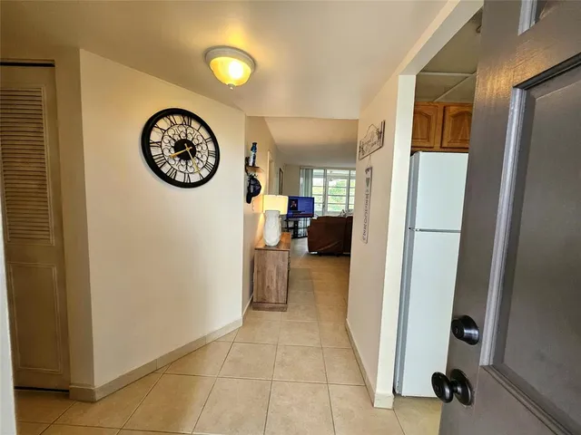 a view of a hallway with elevator