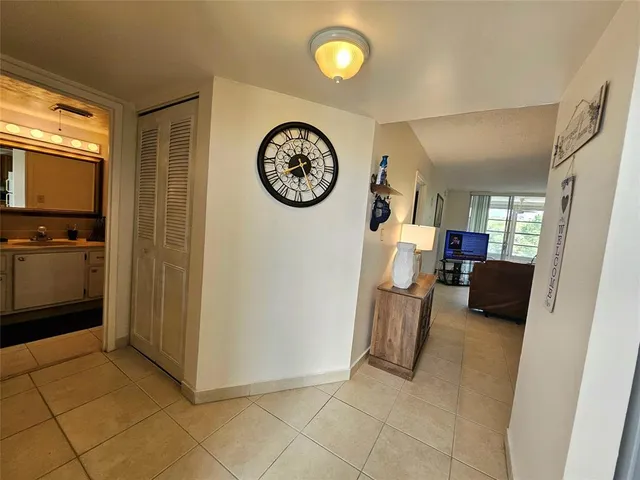 a view of a storage and utility room with a window