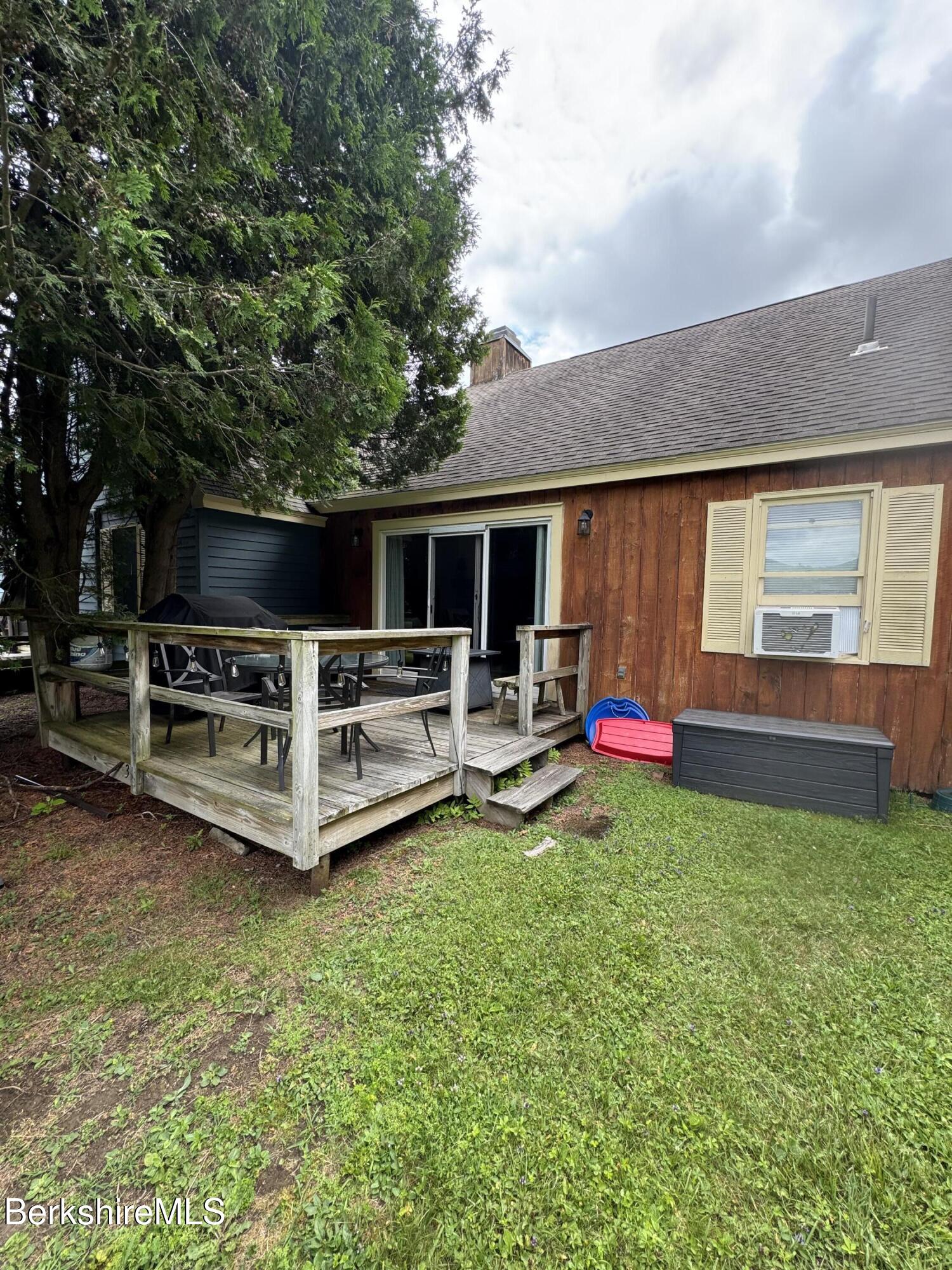 37 Corey Road, Unit 73 Hancock, MA 01237 - Photo 24 of 24 a view of a backyard with sitting area