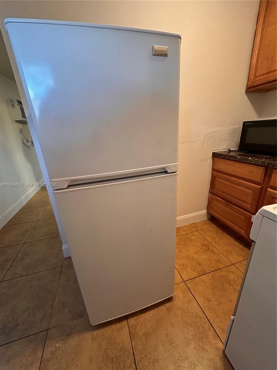 6131 Southwest 39th Street, Unit EAST Miramar, FL 33023 - Photo 13 of 15 a view of an empty room