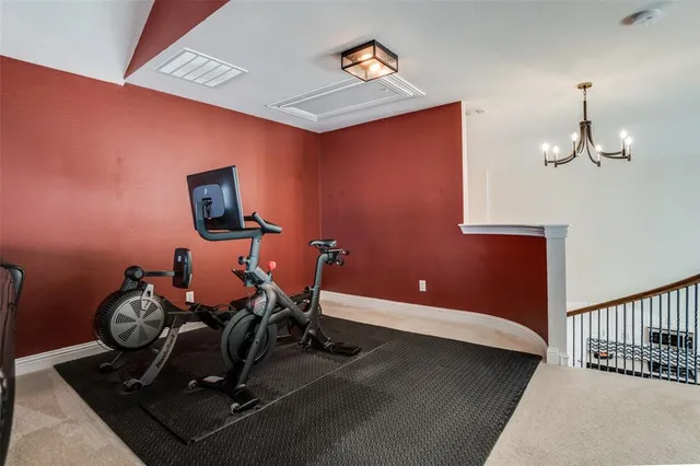 a room with furniture and mirror